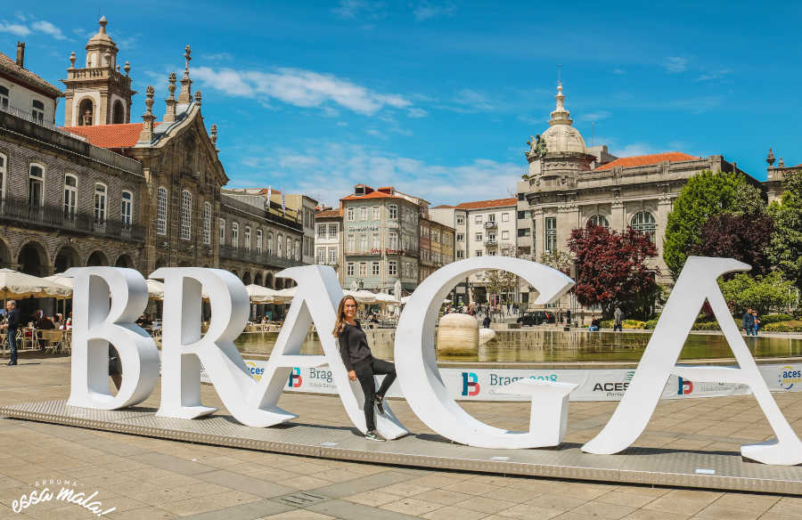 Quais são as atrações mais populares em cada distrito de Portugal